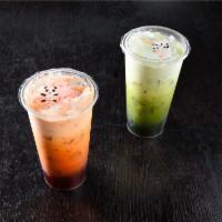 Thai Ice Tea (24 oz) · Just what the title says. Classic iced^ tea from Thailand with optional choice of toppings. ...