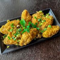 Jumbo Fried Chicken Wing (4 Wings) - Cánh Gà Chiên 4 Miếng · Super crispy breaded fried chicken wings, seasoned with our secret spices, salt and pepper (...