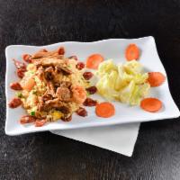 Combination Fried Rice · Com chien dac biet. Chinese sausage, shrimp and with your choice of pork or chicken.