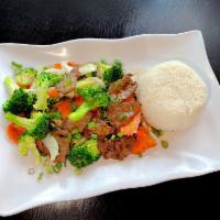 Beef Broccoli with Rice · Stir fried broccoli and carrot in special light brown sauce.