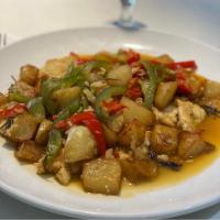 Chicken Scarpariello · sauteed chicken, sweet italian sausage, sweet and hot peppers with a sweet-sour pan sauce