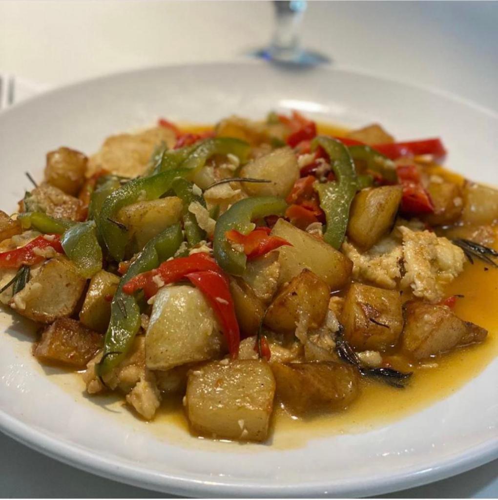 Chicken Scarpariello · sauteed chicken, sweet italian sausage, sweet and hot peppers with a sweet-sour pan sauce