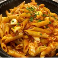 Penne pomodoro · Penne pasta in a marinara sauce with fresh mozzarella