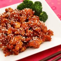 S1. Sesame Chicken · Chunks of chicken deep fried and sauteed with blend of ginger, garlic and wine sauce with fr...