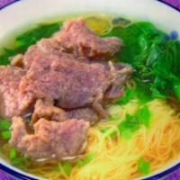 N4. Beef Noodle Soup · Soup that is made with beef, broth, noodles, and vegetables. 