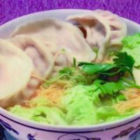 N7. Pork Dumplings Noodle Soup · Savory soup with pork dumplings. 