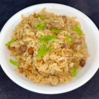  Rice and Peas  · Coconut milk, garlic and additional seasonings are cooked with pigeon peas and allowed to in...