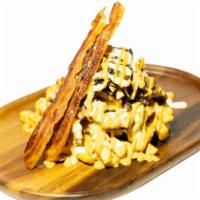 9. Austin French Fries · French fries bowl with chicken, bacon, caramelized onions, mushrooms, topped with blue chees...