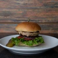 Turkey Burger · Comes with lettuce, tomatoes, red onions, and pickles.