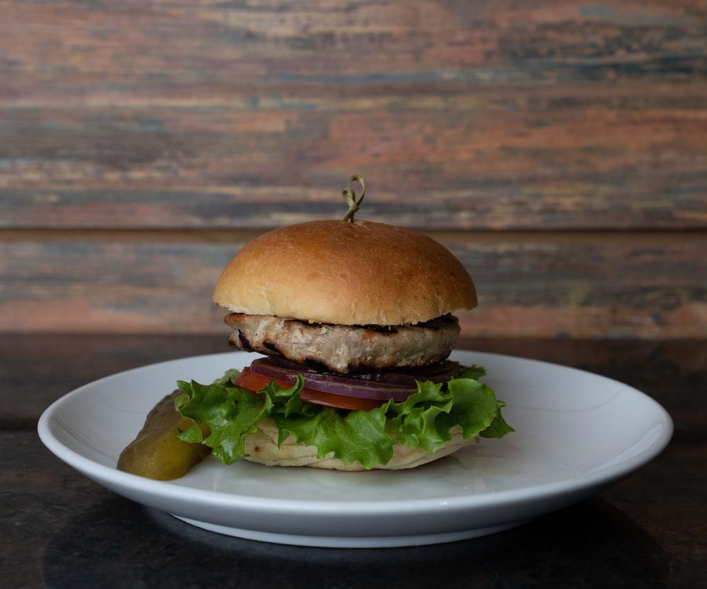 Turkey Burger · Comes with lettuce, tomatoes, red onions, and pickles.