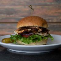 Grilled Chicken Burger · Comes with lettuce, tomatoes, red onions, and pickles.
