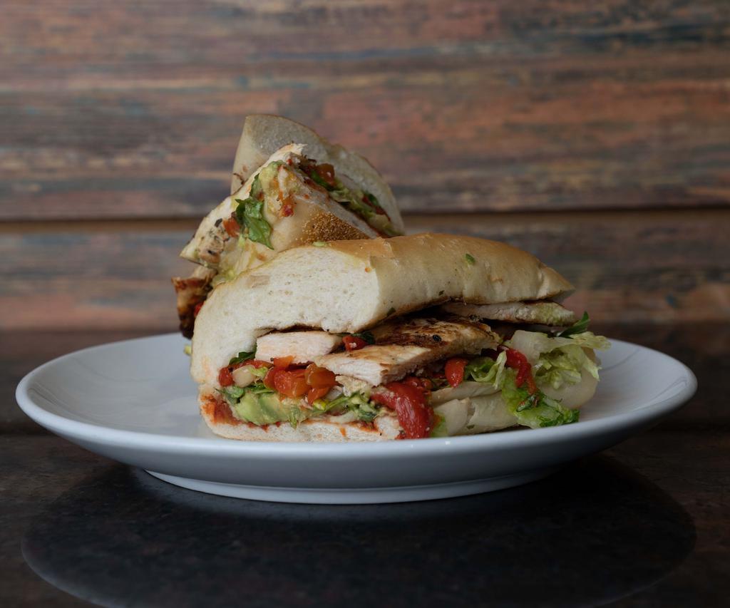 Chicken Fajita Sandwich · Comes with shredded tender chicken breast with slow roasted red peppers and onions, homemade salsa and cheddar cheese. Served with choice of bread.