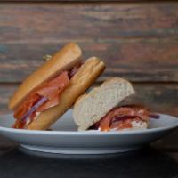 Smoked Salmon Sandwich · Comes with smoked salmon, tomatoes, red onion, and cream cheese. Served with choice of bread.