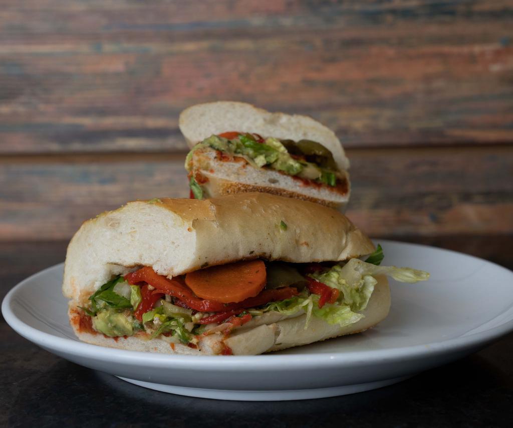 Veggie Vegan Sandwich · Comes with delicious roasted vegetables, arugula, carrots. Served with choice of bread.