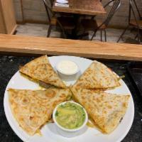 Beef Quesadilla · Comes with juicy beef, a toasted flour tortilla, melted cheddar, and caramelized onions and ...