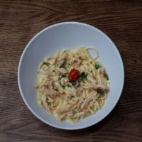 Chicken Alfredo · Linguini pasta in classic creamy Alfredo sauce.