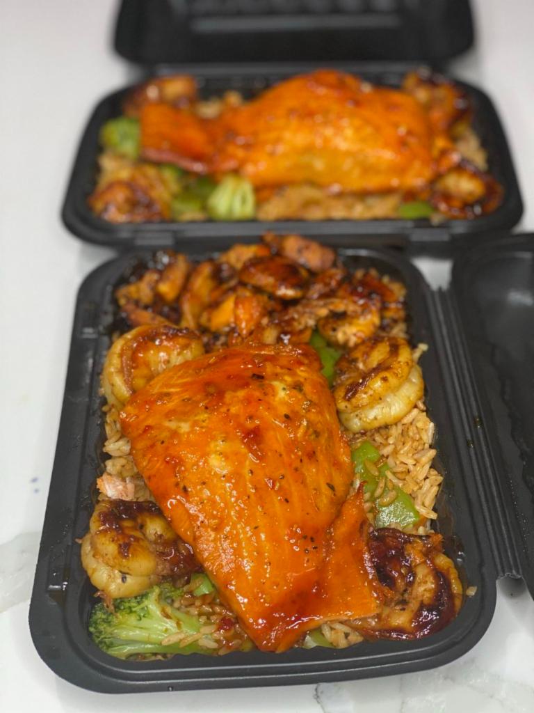 COMBO Spicy  Asian Chicken and Shrimp and Honey Glazed Salmon Bowl · Spicy Asian chicken and shrimp with honey glazed salmon fried rice and veggies.