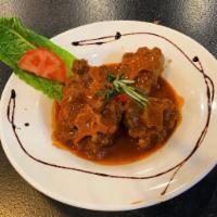 Havana Oxtail/Rabo Encendido · Stewed oxtail , spicy rioja wine creole sauce.