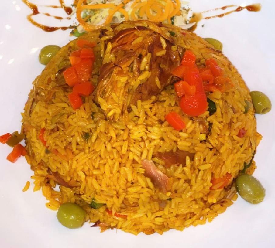 Arroz con Pollo · Chicken with rice.