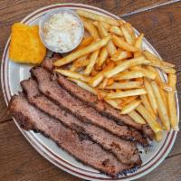 1/2 lb Smoked Brisket Platter with FF · 1/2 lb of our Smoked Brisket, served with Fries, cornbread, and slaw
