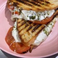 Build Your Own Panini · Pictured: 
Sourdough 
Original Cheese 
Pesto 
Tomatoes