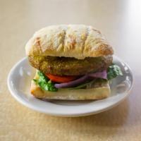 Vegan Burger · Baked vegan veggie patty, on choice of bread or wrap, comes with spinach, tomato, red onion,...