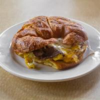 The Suzy B Steak Breakfast Sandwich · Steak, Real cracked Egg souffle (no frozen stuff) with, red onion, roasted red peppers, topp...