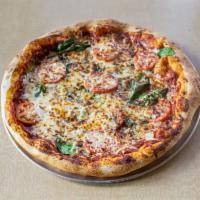 1872 Margherita Pizza · House Blend Red Sauce, Fresh Spinach, Tomato, Basil, and Mozzarella.