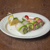 Rainbow Roll · California roll with red snapper, salmon, tuna, avocado, white tuna and shrimp on top.