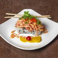 Volcano Roll · Spicy tuna roll on top with mixed crunch, spicy crabmeat, masago with eel and spicy mayo sau...