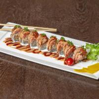 Spicy Ocean Roll · Spicy scallop roll on top with seared spicy tuna, smelt roe and scallion with eel and spicy ...
