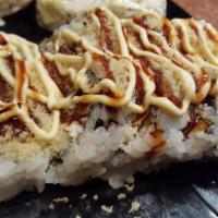 Kentucky Deluxe Roll · Lump crab, bacon and unagi roll, topped with tempura crunch, kewpie mayo and eel sauce. 