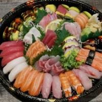 Sakura Special Love Boat · Fifteen pieces of sushi, 20 pieces of sashimi, rainbow roll and dragon roll. Choice of soup ...