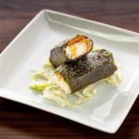 Spam Musubi · 2 piece.
Rice and spam wrapped in seaweed.