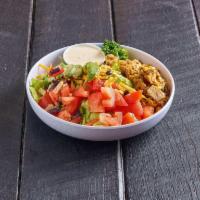 Southwestern Salad · Southwestern corn mixed with cheddar, chicken breast, avocado, 3 bean mix, tortilla strips, ...