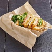 Chipotle Chicken Sandwich · Grilled chicken strip and pepper jack cheese baked on ciabatta with lettuce, tomato, pepper ...