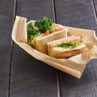 Ham and Jarlsberg Sandwich · Honey ham, Jarlsberg cheese, lettuce tomato and Mendocino mustard on ciabatta bread.