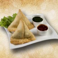 Triangular Spiced Dumpling · 3 pieces fried pastry with a savory filling, such as spiced potatoes, onions, peas served al...