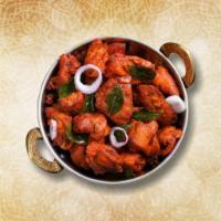 South Side Chicken 65 · Marinated boneless chicken With Indian spices like garlic, bell peppers, and onions and Saut...