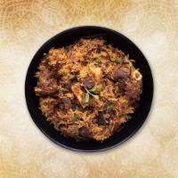 Classic Goat Biryani · Long grained rice flavored with fragrant spices flavored along with saffron and layered with...