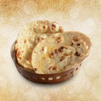 Butter Delight Naan  · Leavened flatbread cooked in a tandoor clay oven with the brush of butter tossed on both the...