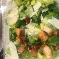 Caesar Salad · Romaine hearts, shaved Parmesan cheese and homemade croutons.