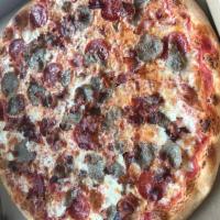 Meat Lovers Pizza · San Marzano tomato sauce, pepperoni, sausage, hamburger, bacon, ham and extra mozzarella.