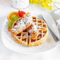 Chicken & Waffle · A delicious waffle served with golden dried chicken.