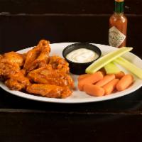 Buffalo Wings · Carrots and celery. Served with homemade blue cheese dressing.