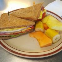 Headline's Hammy Sandwich · Ham, scrambled eggs, American and cheddar cheese on grilled sourdough bread.