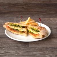 Grilled Chicken Pesto Panini   · Tomato, caramelized onion, Swiss cheese and avocado.