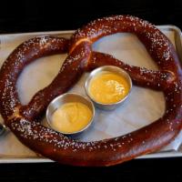 Giant Pretzel · A giant twisted pretzel brushed with butter and sprinkled with salt, served with our HDBC IP...