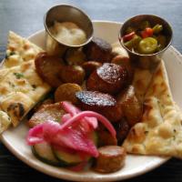 Grilled Sausage Plate · Grilled Italian and Polish sausages served with horseradish mustard, giardiniera, and house ...