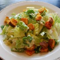 Caesar Salad · Romaine, focaccia croutons, shaved Parmesan and Caesar dressing.